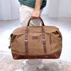 tb01 — handmade leather travel bag (natural calfskin)